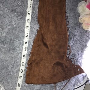Brown lace up over the knee boots